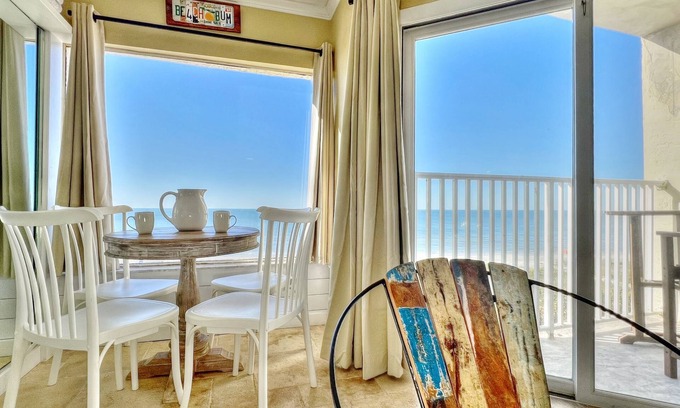 Belleair Beach Condo | Cozy Beachfront Retreat right on the Sand, Sparkling Pool, & Charming Coastal Flair!