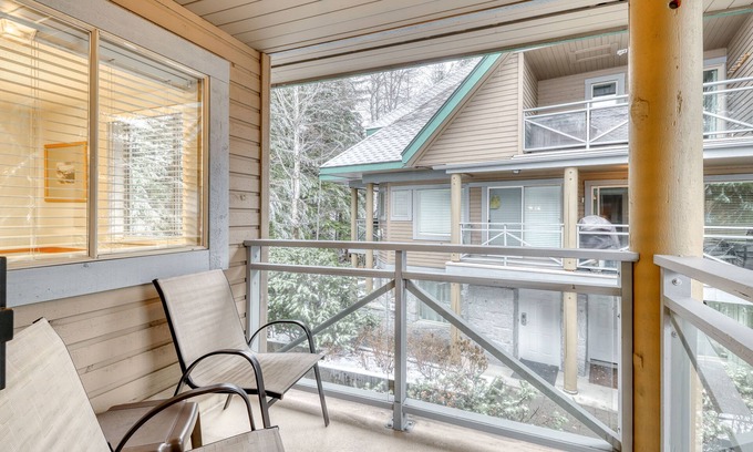 Village North House | Skier's dream townhouse with hot tub, balcony & fireplace - walk to lifts